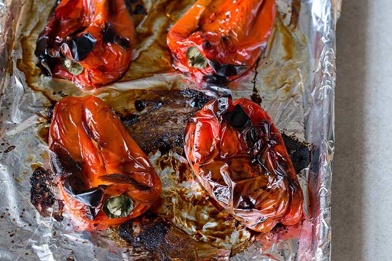 Roasted red peppers with the charred skins still attached