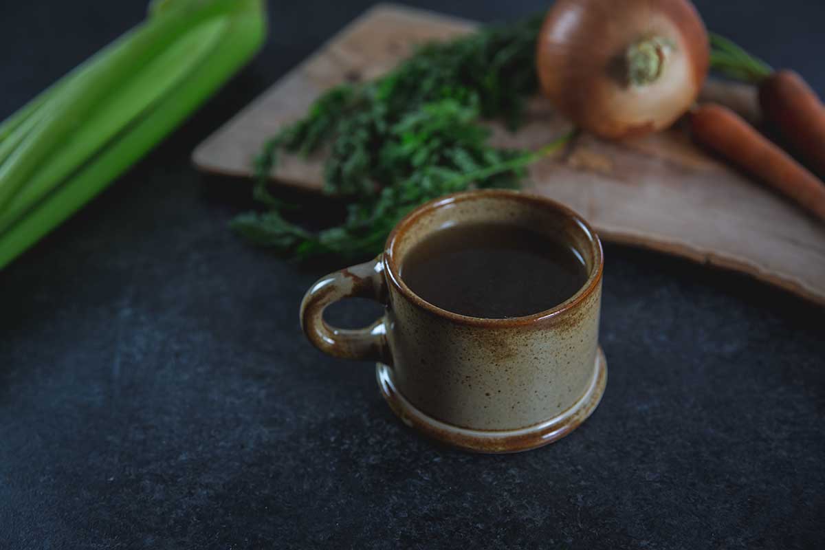 Crockpot bone broth in a mug