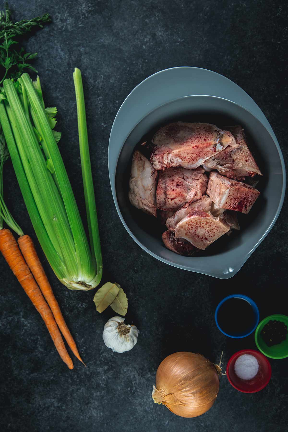 Ingredients for recipe on a blue backdrop