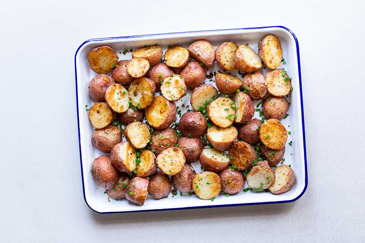 Crispy Roasted Potatoes in center of frame