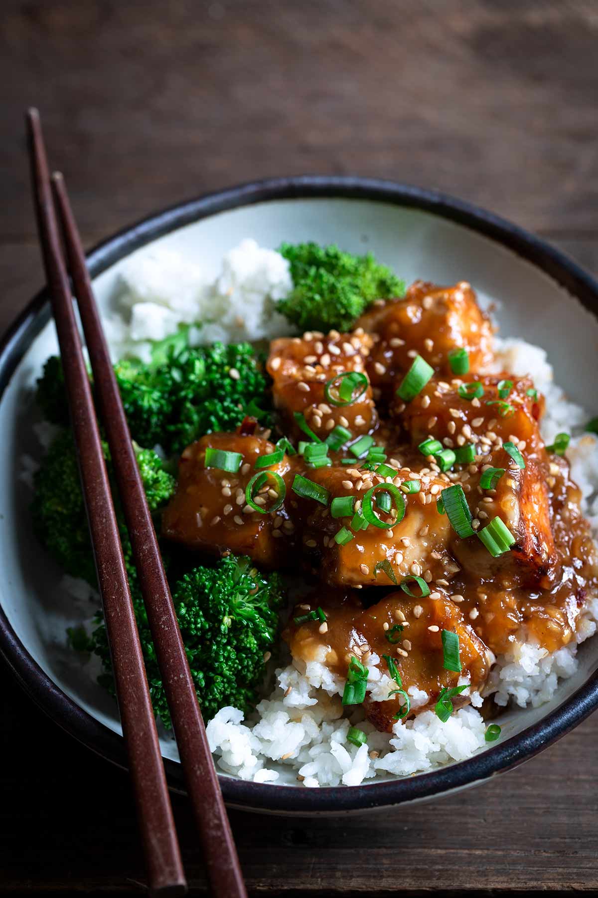 General Tso’s Tofu with chopsticks to the left
