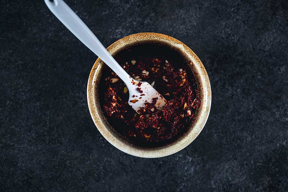 Homemade chili paste in a small bowl