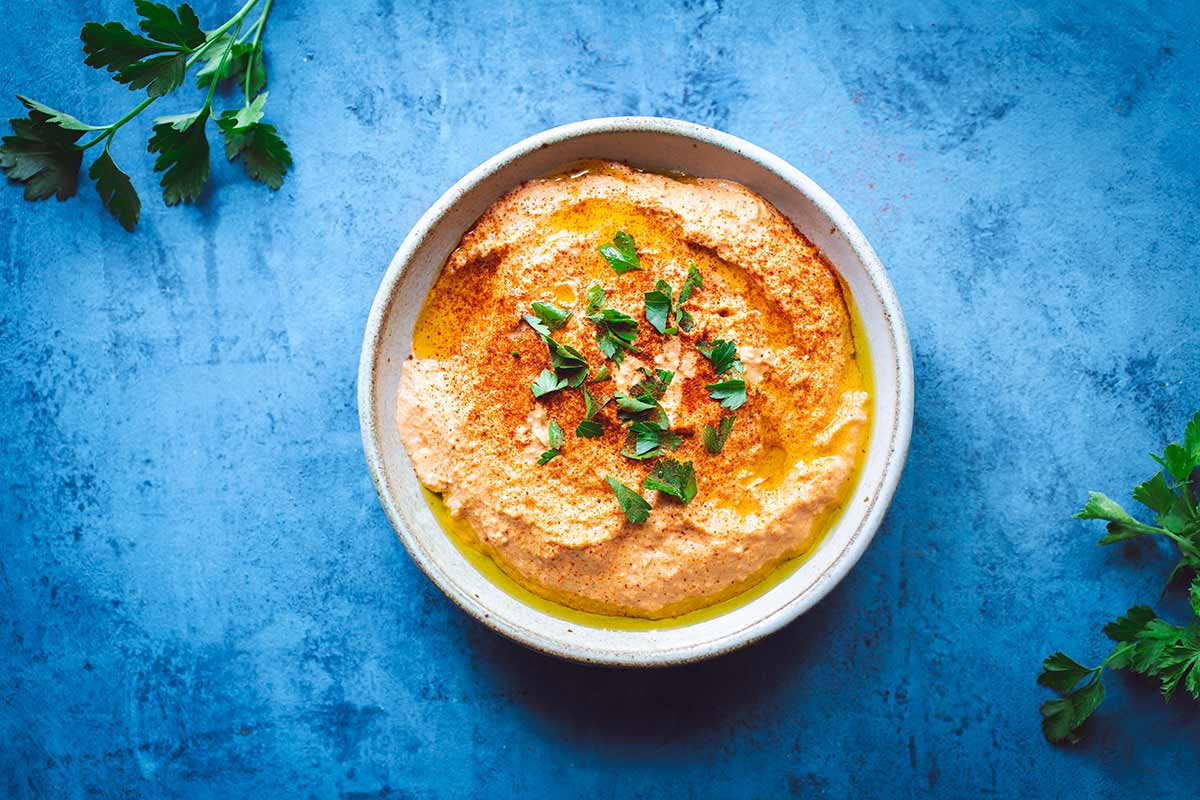 Roasted Red Pepper Hummus in center