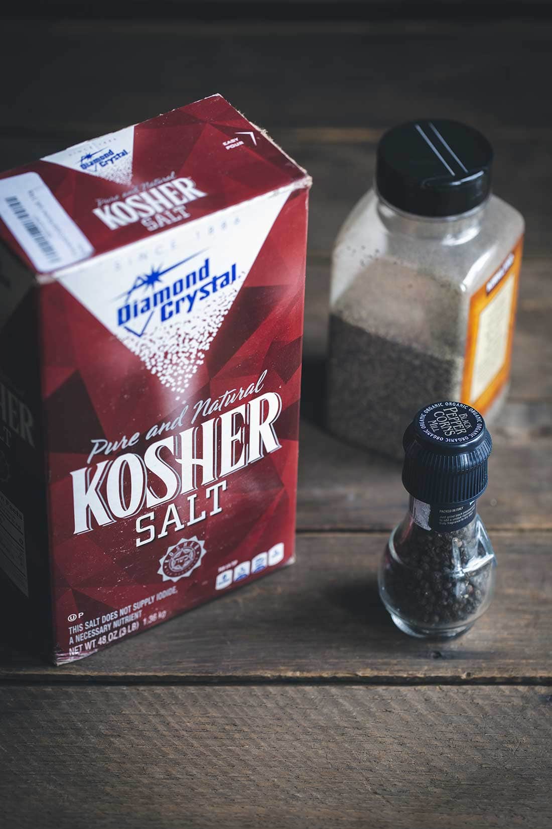 Salt and pepper to taste - a box of salt and a pepper mill