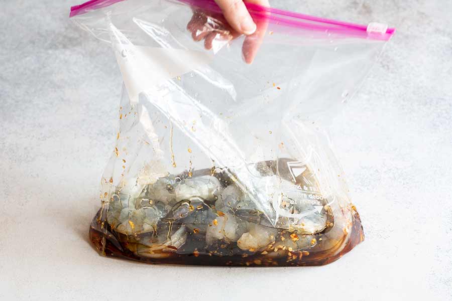 shrimp marinating in honey soy sauce