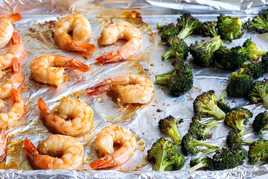 sheet pan honey garlic shrimp and broccoli cooked