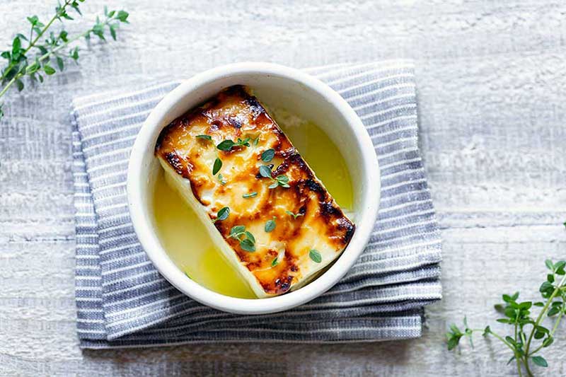 broiled feta topped with honey and thyme 