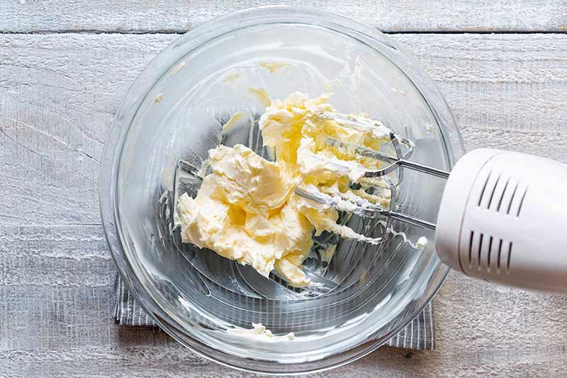 whipping butter with an electric hand mixer