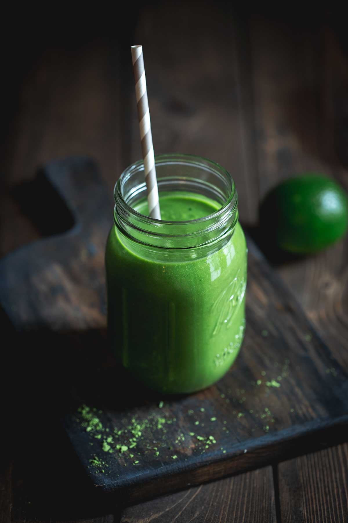 Pineapple smoothie in glass with straw