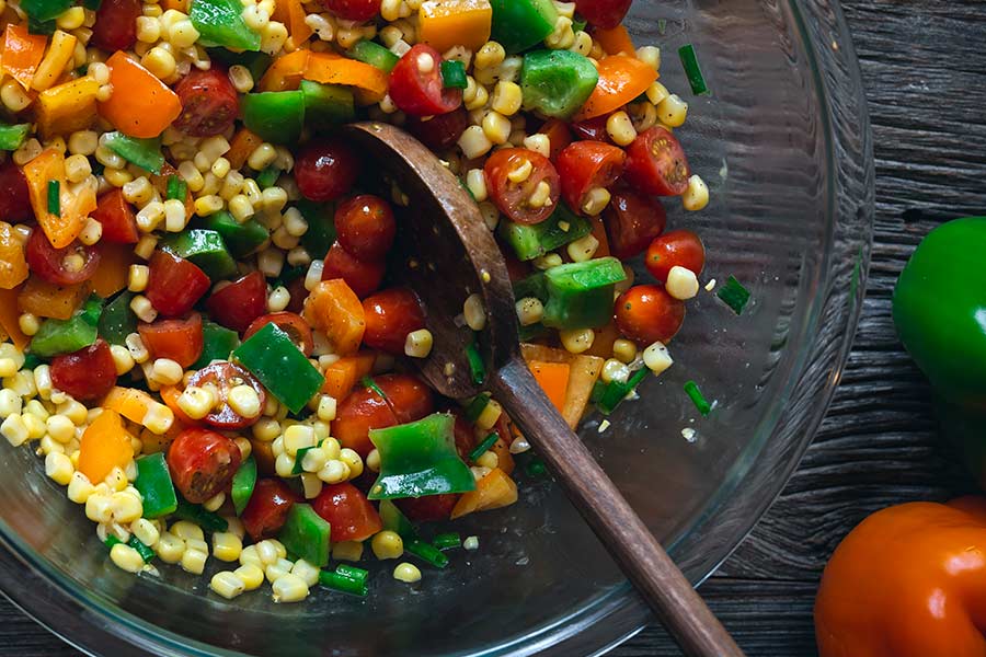 Stirring the recipe ingredients together in a large bowl