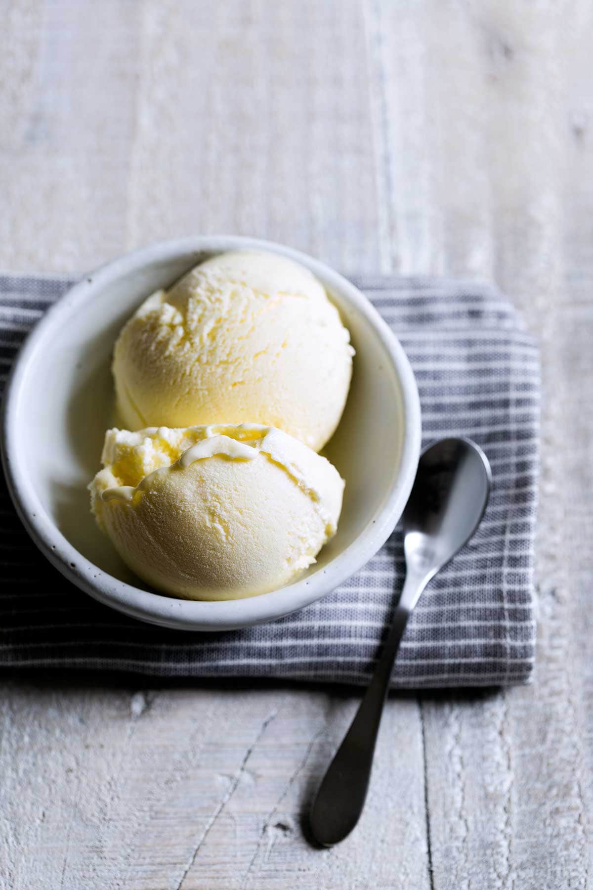 Finished lemon ice cream recipe in a bowl on a napkin