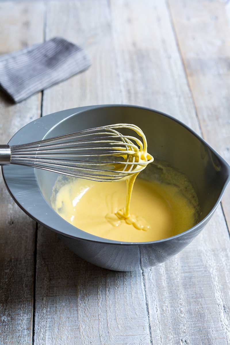 Whisking yolks and sugar to ribbon stage