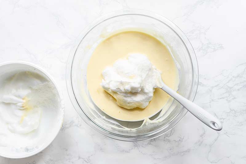 folding egg whites into remaining souffle mixture