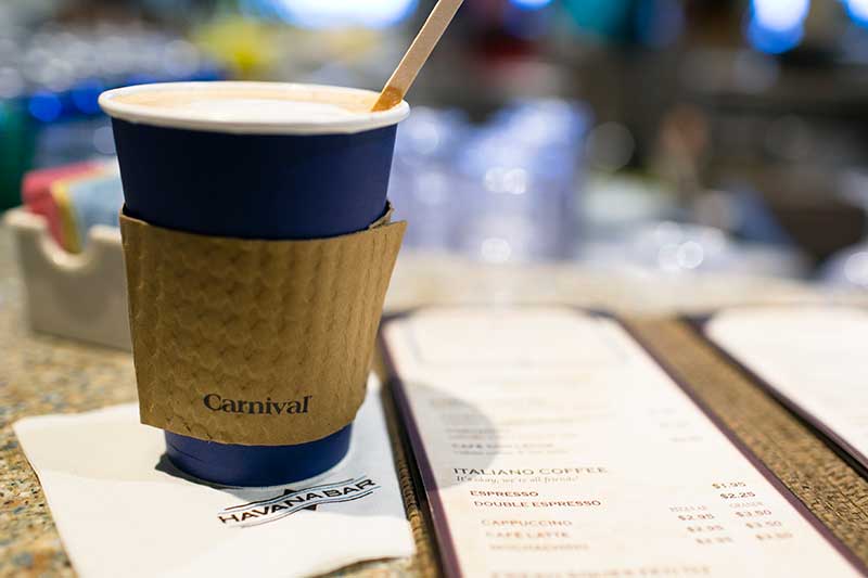 Coffee from Carnival's Havana Bar, sitting on a napkin next to a menu