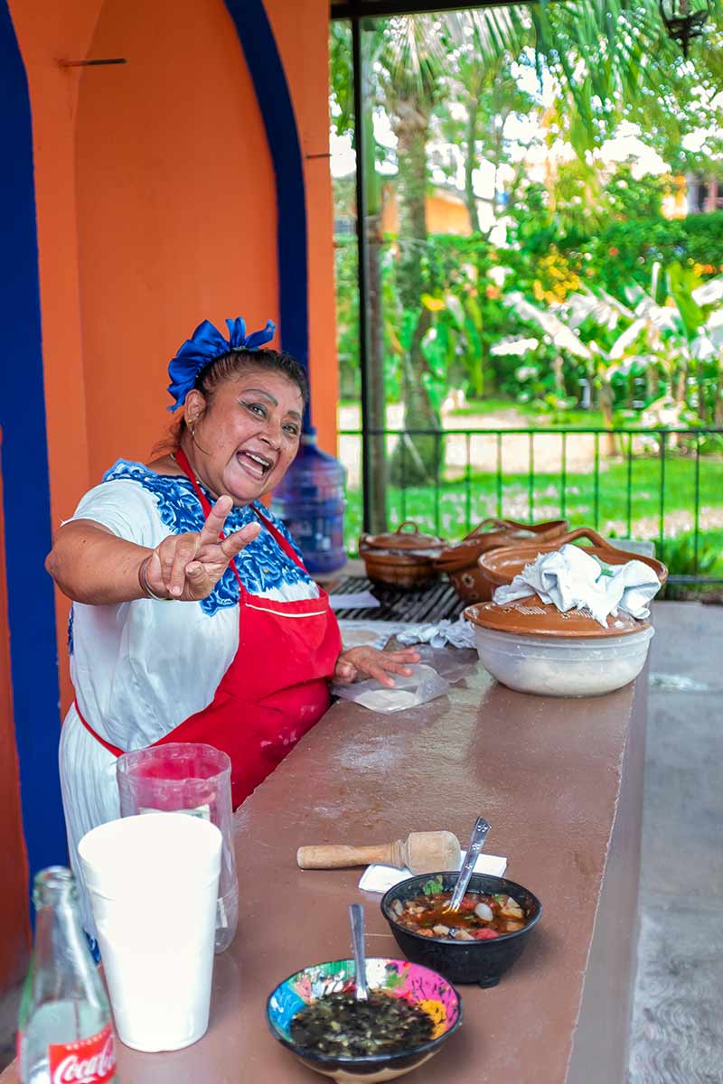 A woman in Cozumel making tacos