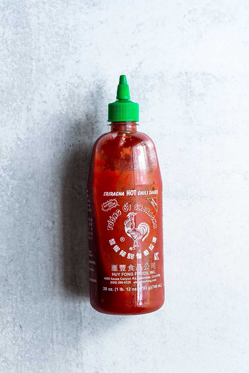 Closeup of Huy Fong Sriracha bottle