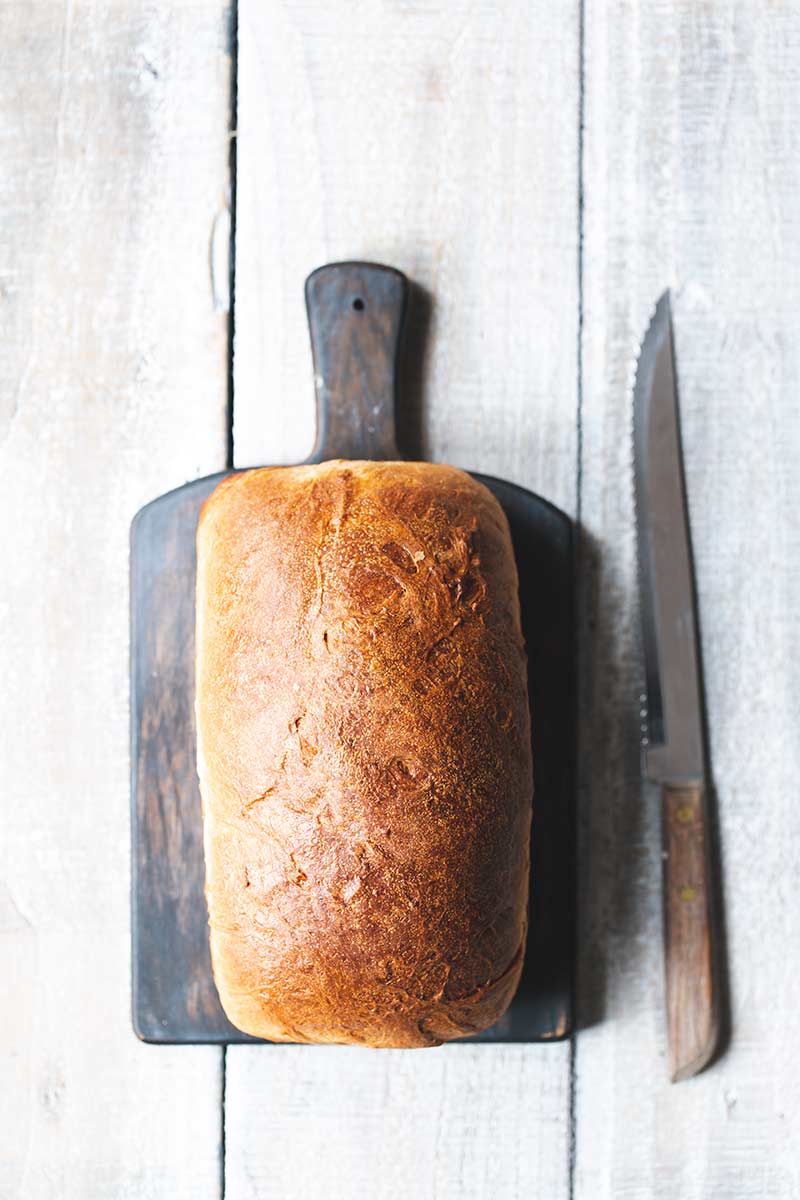 Milk bread recipe on a bread board.
