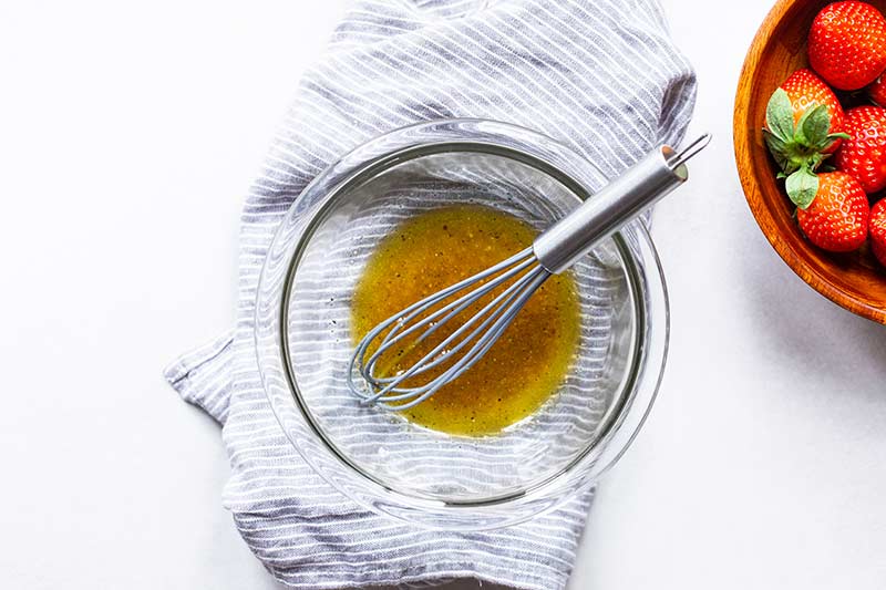 Stone ground mustard vinaigrette in a bowl.