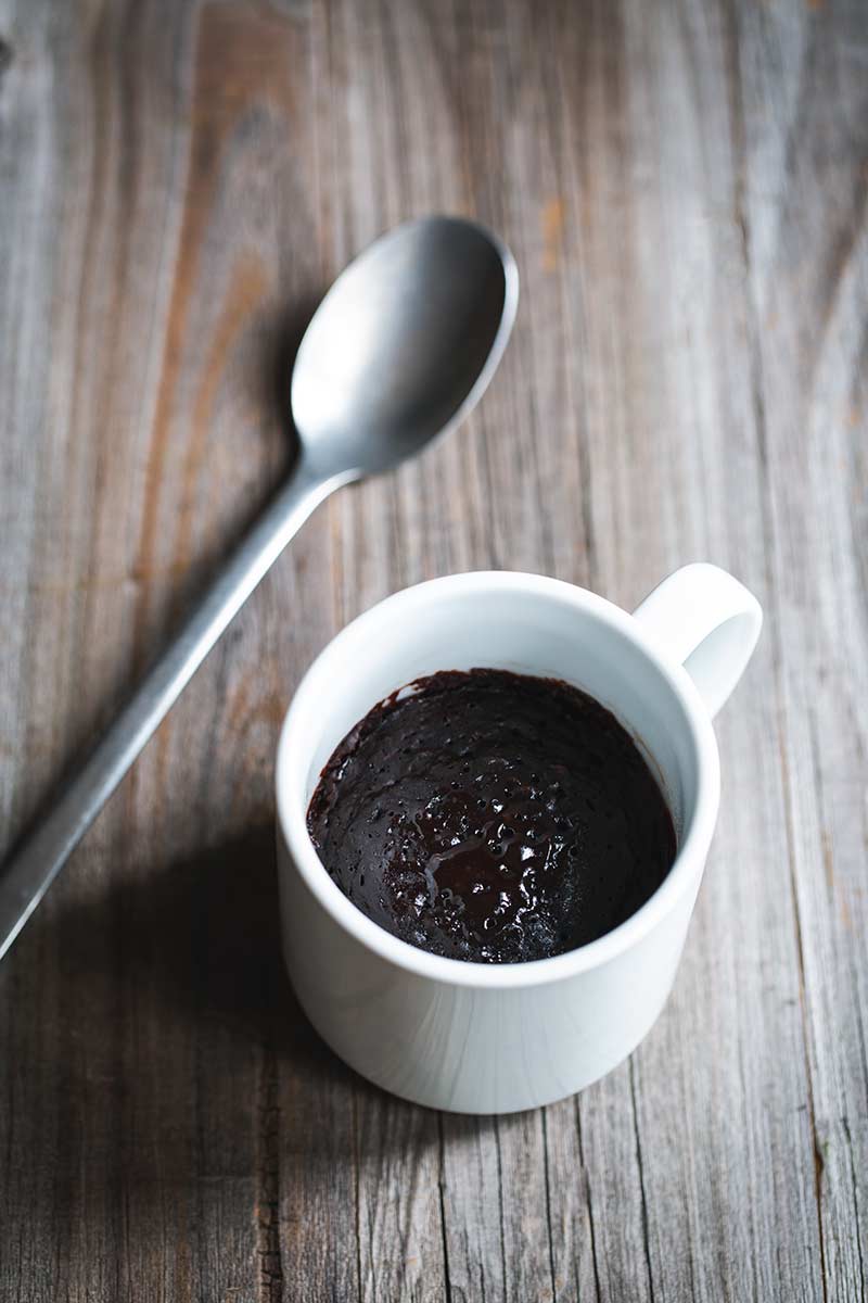Brownie in a mug just out of the microwave