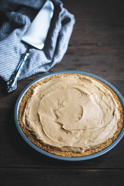 Peanut butter pie recipe next to a serving piece and napkin