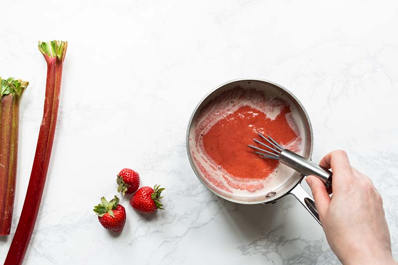 Strawberry rhubarb puree whisked into gelato base